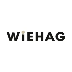 WiEHAG The image shows the word “WIEHAG” in bold black letters on a white background. The dot above the letter “I” is beige instead of black.